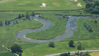 Aerial image of the site „Sandacker“ in Lippstadt-Eickelborn, with the newly created waterbodies and terrestrial habitat at the top.