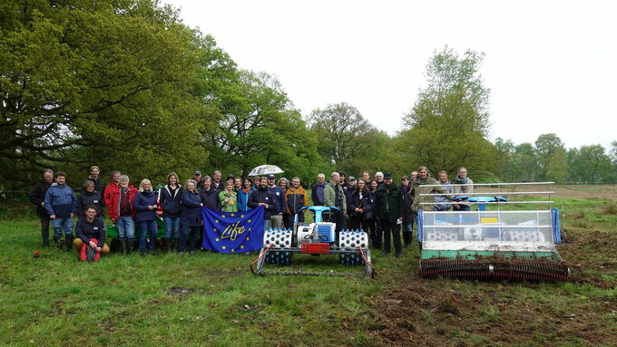 The excursion group with the demonstrated insect-friendly sickle bar mower